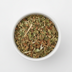 Cut and sifted sheep's sorrel herb in a white ceramic bowl on a white background, mixed green leaf pieces and stems