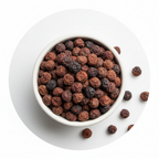 Whole dried saw palmetto berries in a white ceramic bowl on a white background
